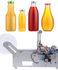 Semi Automatic Label Applicator Round Bottle Labeling Machine with bottles in various colors for packing beverages.