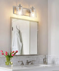 Bathroom with chrome vanity light fixture over mirror featuring crystal glass globes, sleek modern design, easy install