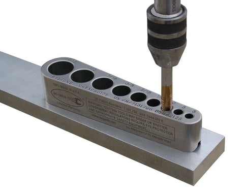 Straight Shooting V Tap Guide For Screw Thread Inserts And Heli Coil Jobs delivers precise alignment on metal surface with drill.
