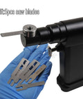 Knockout Veterinary Orthopedic Mini Bone Saw With Micro Oscillating Drill showing blades in hand with surgical saw blade attachment.