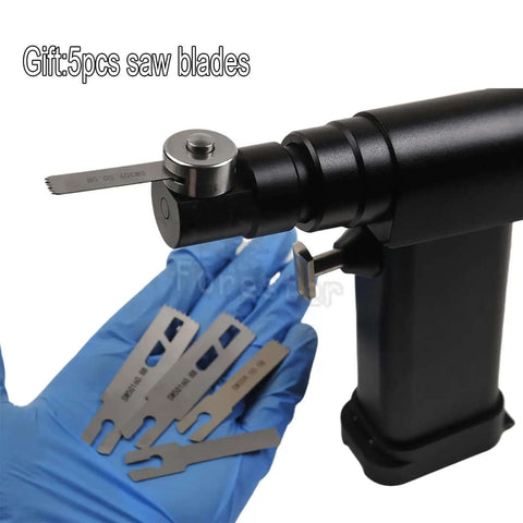 Knockout Veterinary Orthopedic Mini Bone Saw With Micro Oscillating Drill showing blades in hand with surgical saw blade attachment.