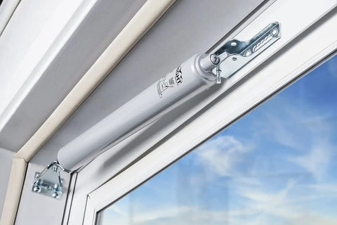 Standard Duty Pneumatic Door Closer For Screen And Storm Doors Black Finish installed on white door frame
