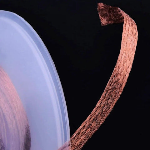5 Ft Pro-Grade Copper Desoldering Wick With No Clean Design And 280C Melting Point unraveling, showing braided texture and spool