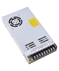 Space-Saving 1U Enclosed Power Supply 24V DC 350W 14.6A For Control Cabinets, Slim High Power Module With Wide Input 90-264VAC Or 240-370VDC, Durable Enclosed Design For Quiet, Reliable Output. Slim silver metal PSU with terminal block and fan vent