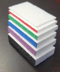 Premium Foam Wall Flattening Shim Set Featuring 900 Plus Varying Thickness Shims And Quick Read Depth Gauge showing stacked foam shims.