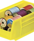 Go-To Stackable Plastic Storage Bins For Garage, Pantry, And Craft Room, Space-Saving Yellow Organizers holding thread spools