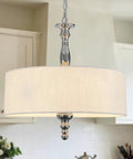 Hip Black Drum Chandeliers Four Light Semi Flush Mount Ceiling Light Fixture with black linen shade in a kitchen setting
