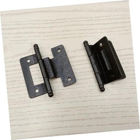 Six pack self closing cabinet hinges on white wood surface