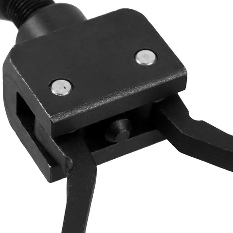 Close-up of Kickass Lightweight Steel Bearing Puller Tool with precision gripping arms for hub extraction.