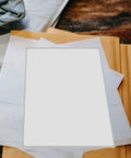 160 Sheets 4x6 Inch Waterproof Synthetic Paper Shipping Labels with ample writing space stacked on envelopes