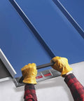 18 Inch USA Made Drip Edge Folding Tool For Standing Seam Roofing Panels Built To Last With High Leverage Two Post Handle in use