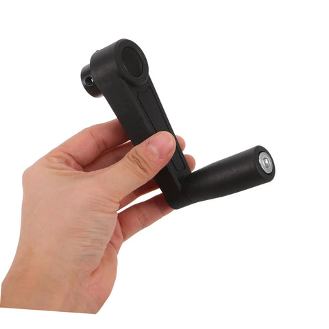 Black Plastic Round Hole Crank Handle Replacement Compatible With Rv Vent And Camper Antenna Height Adjustment held in hand.
