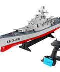 Boss Battleship Boat Twin Electric Engines 2.4G Remote Control Warship for Adults, model on stand with remote and battery pack