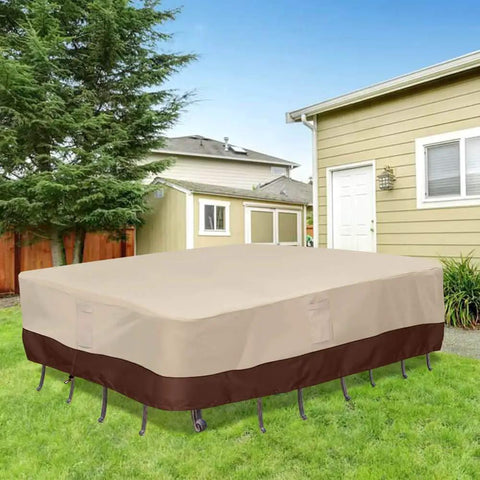 Waterproof Patio Furniture Cover With Padded Handles For Rectangular Dining Table And Chairs Heavy Duty 600D Oxford UV Stabilized And Weatherproof Coating Outdoor All Weather Protection For Table And Chairs Medium installed on outdoor furniture