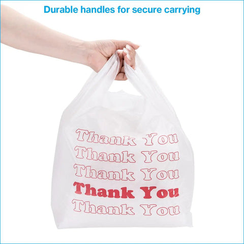 Hand holding White Thank You Bags Case Of 1000, 11.5 By 6 By 21 Inches, 0.48 Mil HDPE Plastic, Standard Grocery Size