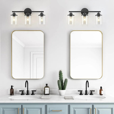 Three Light Matte Black Vanity Light With Clear Glass Shades For Bathroom above dual mirrors and sinks