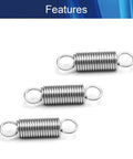 Three stainless steel dual-hook tension springs with looped ends.