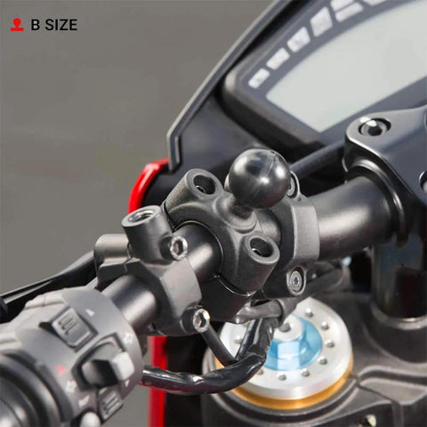 Motorcycle handlebar with Torque Handlebar Mount Base With One Inch Ball For Three Quarters To One Inch Bars, mounted securely.