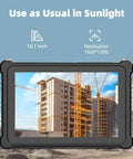 Straight Up Badass 10.1 Inch IP67 Rugged Industrial Tablet PC Running Windows 11 viewing a construction site in bright sunlight.