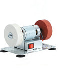Badass Compact Bench Grinder With Dual Wheel Grit Setup Sleek Steel Body Heavy Duty Motor Housing Quick Swap Stones Shop Ready No Drama Finish For Real Jobs on white background.