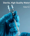Top Notch 1cc Syringe With Needle 31G 1/4 Inch 6mm Sterile Pack Of 100 For Precise Dosing, Smooth Electro Polished Needle, Easy To Use, Medical Grade, Eco Friendly And Safe, 1ml syringe held in gloved hands