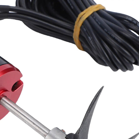 Close-up of an Underwater Thruster For RC Boats Beefy 6kg Thrust Brushless Submarine Motor with 3 Blades Propeller, cable visible.