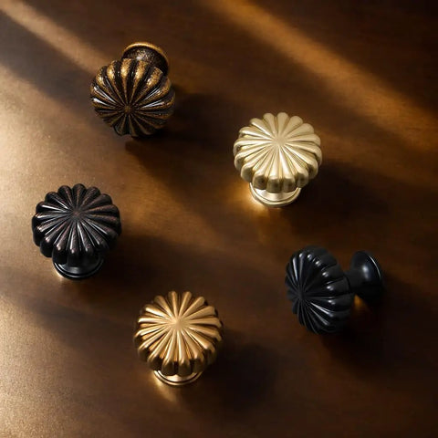 10 Pack Vintage Round Cabinet Knobs 1.1 Inch Brushed Brass Drawer And Wardrobe Handles on dark wood surface