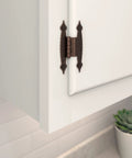 Smooth Swinging Offset Cabinet Hinges One Pair 3/8 Inch Oil Rubbed Bronze Butterfly Wood Hardware For DIY Builds Straight Fire Sweet Refresh For Your Spot installed on a cabinet door.