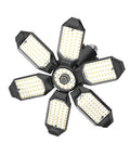 LED Garage Lights 12 Pack Black Finish For Ultra Bright Even Coverage In Your Garage Shop Or Basement Energy Efficient Durable Fixtures Easy Install Wide Area Illumination For Any Workbench Environment featuring a flower-shaped LED panel.