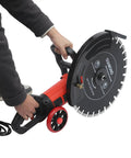Close-up of 4000 Watt Electric Concrete Saw With 16 Inch Diamond Blade for Wet Or Dry Cutting, held by a user for precision cutting.