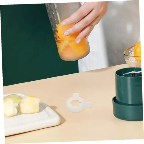 Hand holding fruit near Six Pointed Star Ice Cream Nozzle Caps Set For Commercial Soft Serve Machines on counter