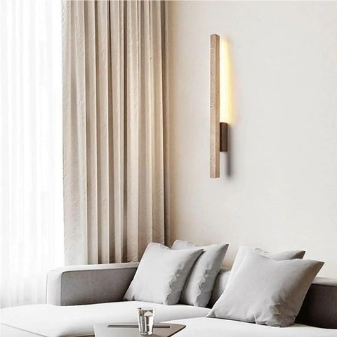 Linear Wall Sconce Wood Grain Strip Wall Light Slim Vertical Lamp Modern Minimalist Fixture Warm Lighting for Bedroom Living Room Hallway Background Wall Decor on a wall next to a couch with neutral decor.