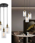 Three Light Black Pendant Light With Seeded Glass Shades, modern farmhouse chandelier over dining table