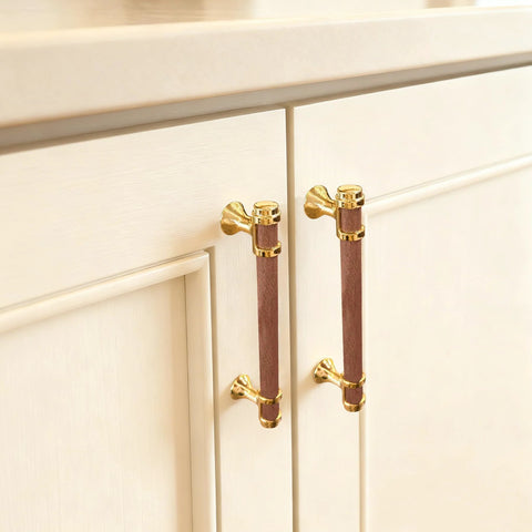 10 Pack 5 Inch Cabinet Pulls In Wood And Gold Finish installed on a kitchen cabinet, round wood handles with 128mm center to center