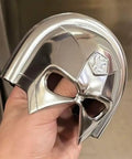 Rad Chrome Paint Pint Kit Featuring 2K Basecoat And 1K Topcoat delivers a shiny chrome mask held in hand.