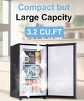 Sleek 3.2 Cu Ft Upright Mini Freezer With Adjustable Removable Shelves And Dope Silver Cabinet, showing interior organization of food.
