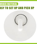 Heavy Duty Rubber Drain Plug With Hanging Ring Shuts Nasty Smells Dead Fits Like A Glove On One Point Five To One Point Six Inch Pipes Kills Clogs Fast Works Like A Charm For Kitchen And Bath Setups Two Pack White from top view showing ring.