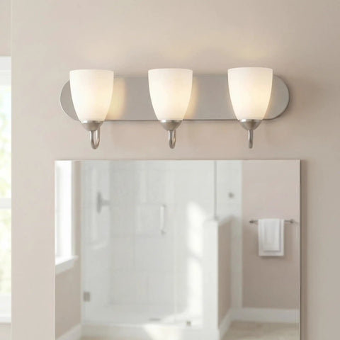Gather Collection Three Light Bath Vanity Light With Etched Glass Shades In Brushed Nickel Finish installed above bathroom mirror