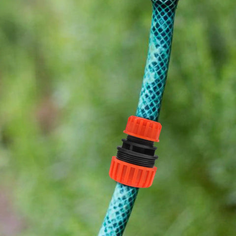 Close-up of Two Pack One Half To Three Quarter Inch Garden Hose Repair Menders Connectors Adapters with ABS plastic construction