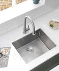 Deep 23 Inch Undermount Stainless Steel Kitchen Sink With 16 Gauge Single Bowl Ultra Durable Rust Resistant Easy Clean Ideal For Kitchen Or Laundry Room And Outdoor Utility Use installed in a modern kitchen area.