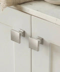 Sweet Brushed Nickel Cabinet Knobs 6 Pack Premium Zinc Alloy Square Drawer Pulls on white cabinet doors.