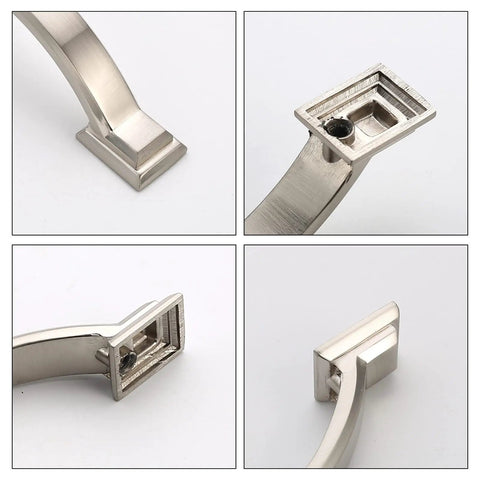 Close-up of silver metal cabinet pulls showing detailed angles and installation features.