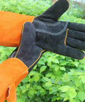 Heavy Duty Leather Welding Gloves With Extra Long Gauntlets For Extreme Heat Protection And Fireproof Work Safety In Your Shop, displaying black and orange cowhide.