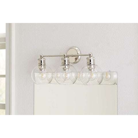 Three Light Coastal Vanity Light With Clear Glass Shades In Polished Nickel Finish For A Modern Beachy Bathroom Glow And Vibe