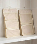 Game Changer 2 Pack Mesh Hanging Closet Storage Organizers Beige Foldable with pockets for bras and socks on a shelf.