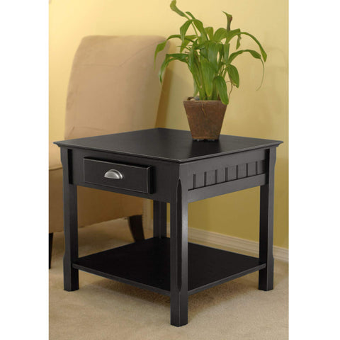 Round Beechwood End Table In Black Finish With Storage Drawer And Open Shelf, Rustic Modern Accent Piece, next to a sofa