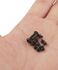 Knifemen Gonna Swear By This Badass 20 Piece Pocket Knife Upgrade Kit Featuring Deep Carry Clip And Omega Springs Compatible With Benchmade Bugout 535, showing black replacement screws in hand.