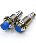 FRCM18-5DO M12 Connector Motion Inductive Proximity Sensor for Industrial Automation High Precision Detection Fast Response Rugged Build Easy Plug In Ideal for Conveyor Lines and Machinery, two metal cylindrical sensors with blue caps