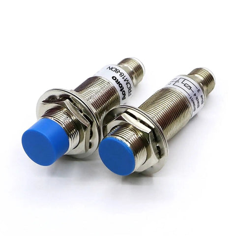 FRCM18-5DO M12 Connector Motion Inductive Proximity Sensor for Industrial Automation High Precision Detection Fast Response Rugged Build Easy Plug In Ideal for Conveyor Lines and Machinery, two metal cylindrical sensors with blue caps