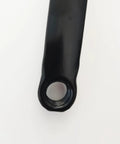 Close-up of black 165mm crank arm for single speed crankset, square taper end for mountain and road bikes and fixed gear folding bicycles.